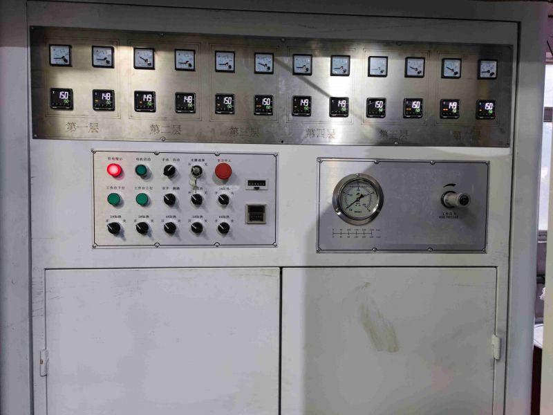 热压机如何实现工作台热压驱动和手动操